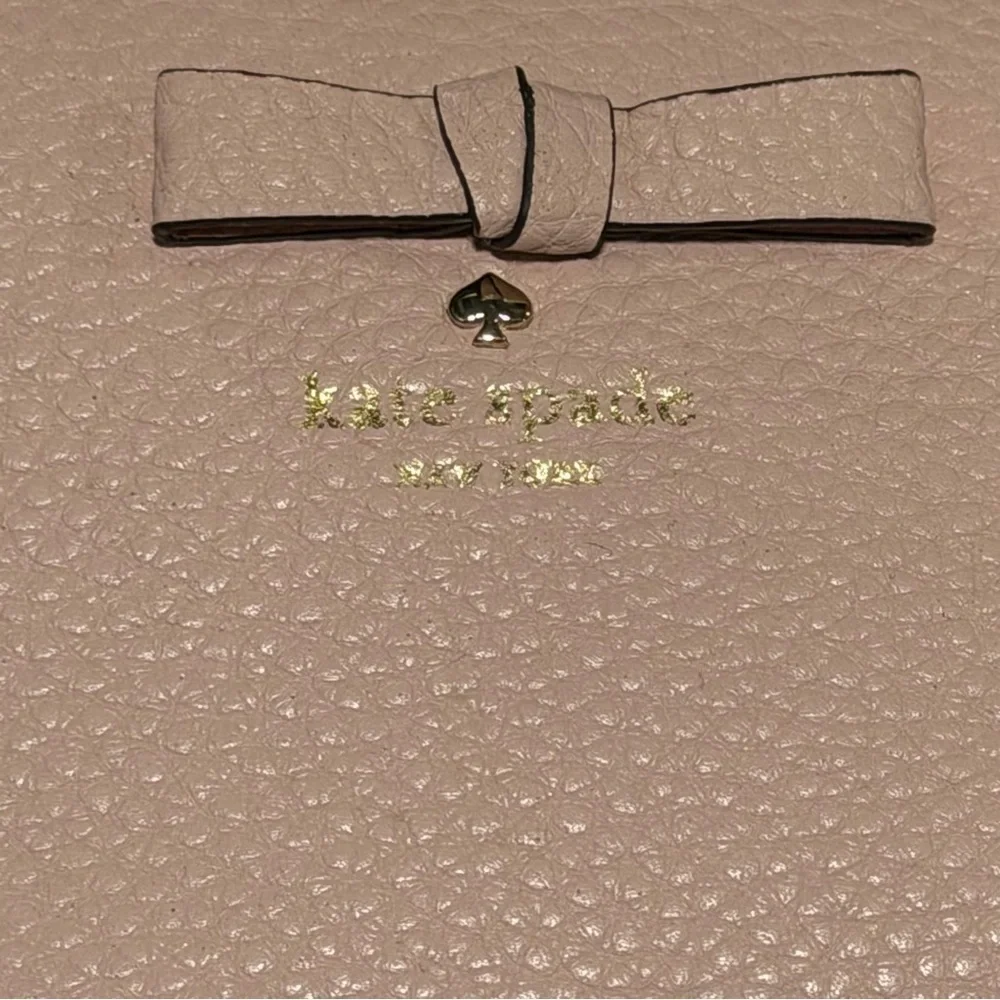 kate spade Pebbled Leather Bow Continental Wallet in Dusty Pink